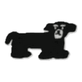Chien noir allongé
